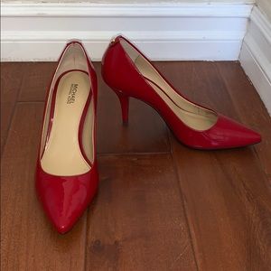 MK Red Patent Pumps